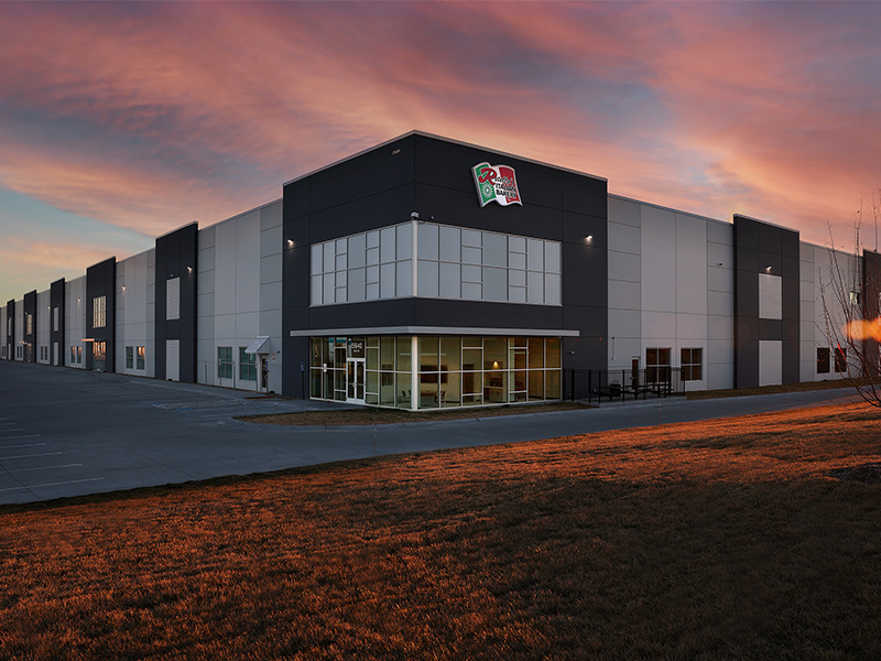 Large, upscale, finished black and white industrial building