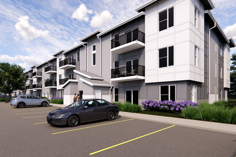 Rendering of a three‑story apartment building (The Rye at Harrison - Phase 1) with gray and white siding, black railings on balconies, and parking spaces along the front.
