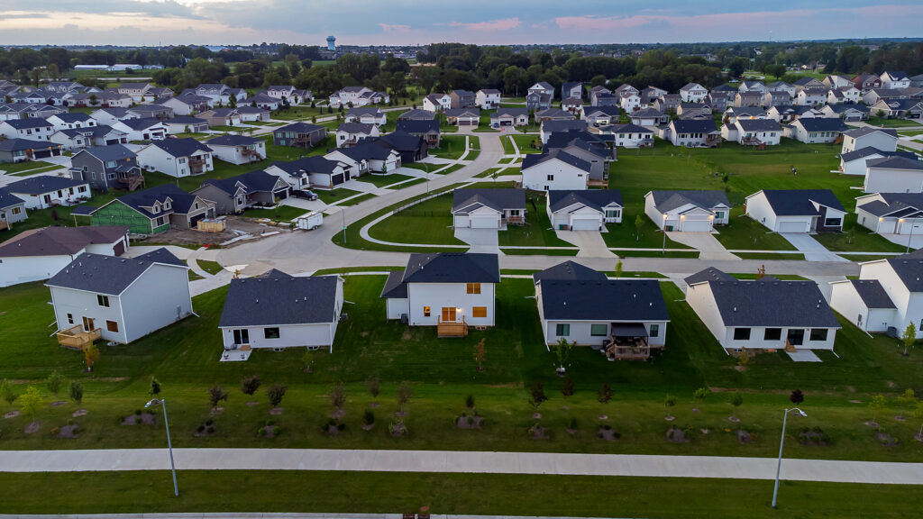 rows of homes at sunset