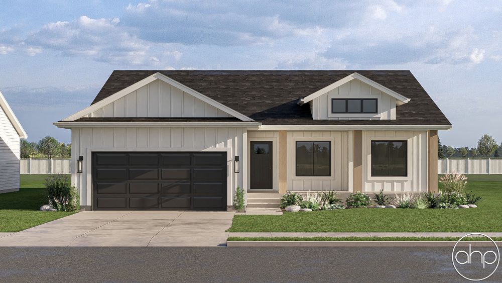 two story ranch home with white siding and two car garage