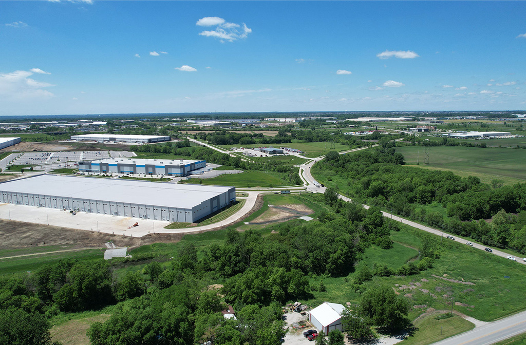 Aerial landscape surrounding Hubbell’s Crosswinds Distribution Center II, including nearby roads, industrial buildings, and dense green areas.