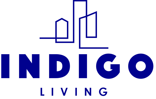 Indigo Living logo featuring a stylized city skyline icon above the words ‘INDIGO LIVING’ in bold purple lettering.