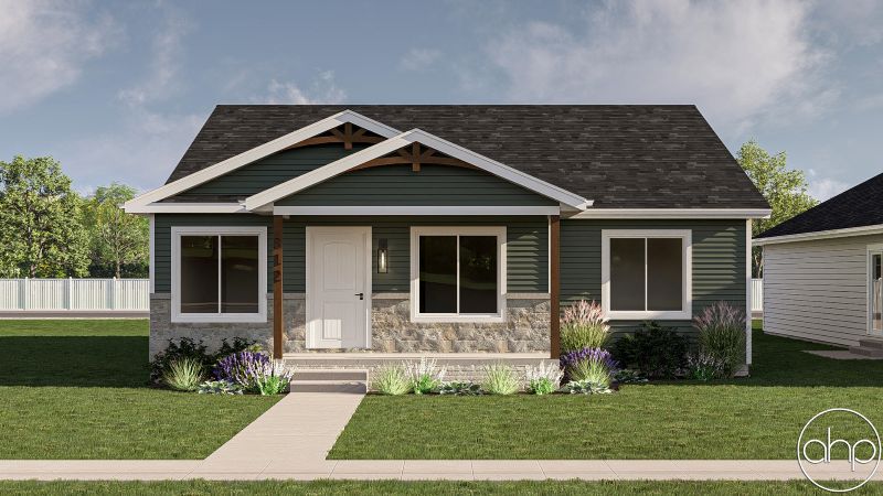 small green house with stone front