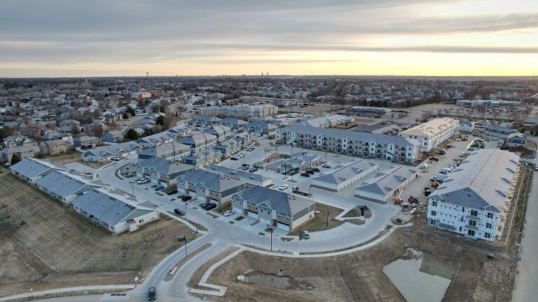 aerial view of apartments and townhomes