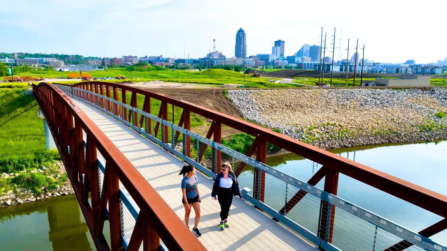 runners over a bridge